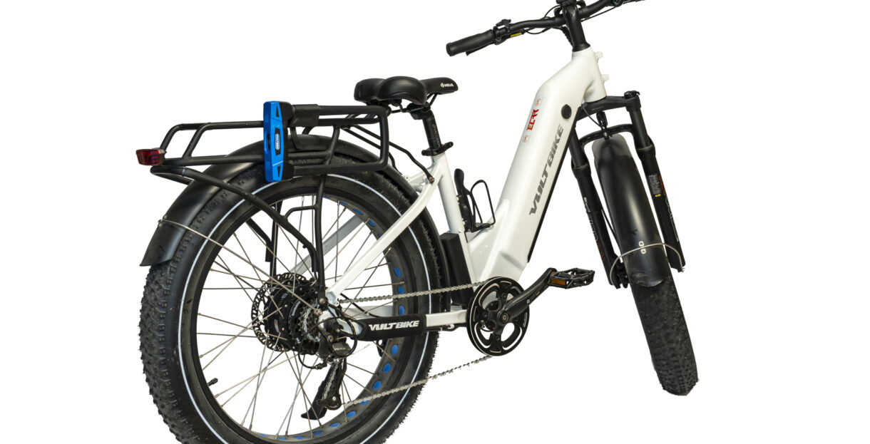 Rider unfolding a foldable e-bike before embarking on an urban commute
