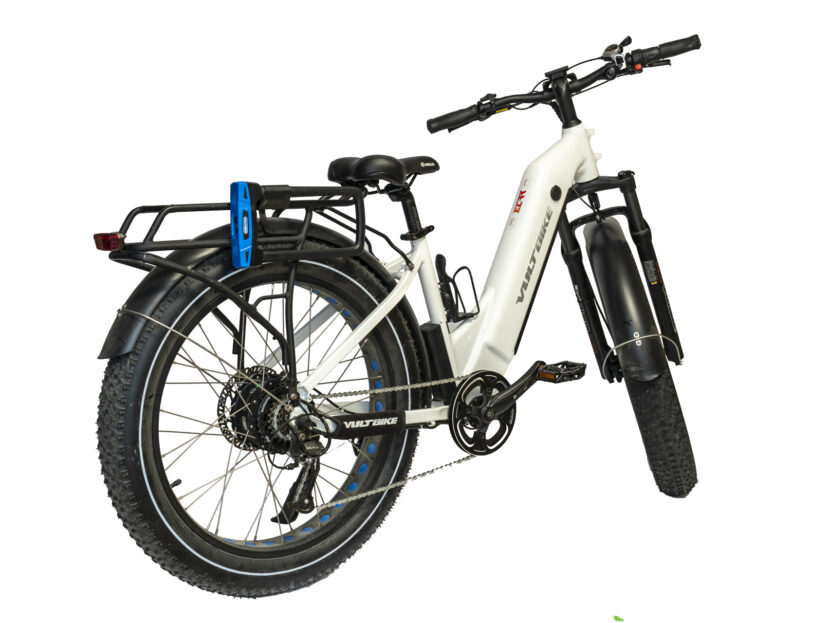 Rider unfolding a foldable e-bike before embarking on an urban commute