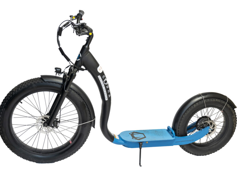 Detailed view of the sturdy frame and wide tires of a stylish fat-tire electric scooter