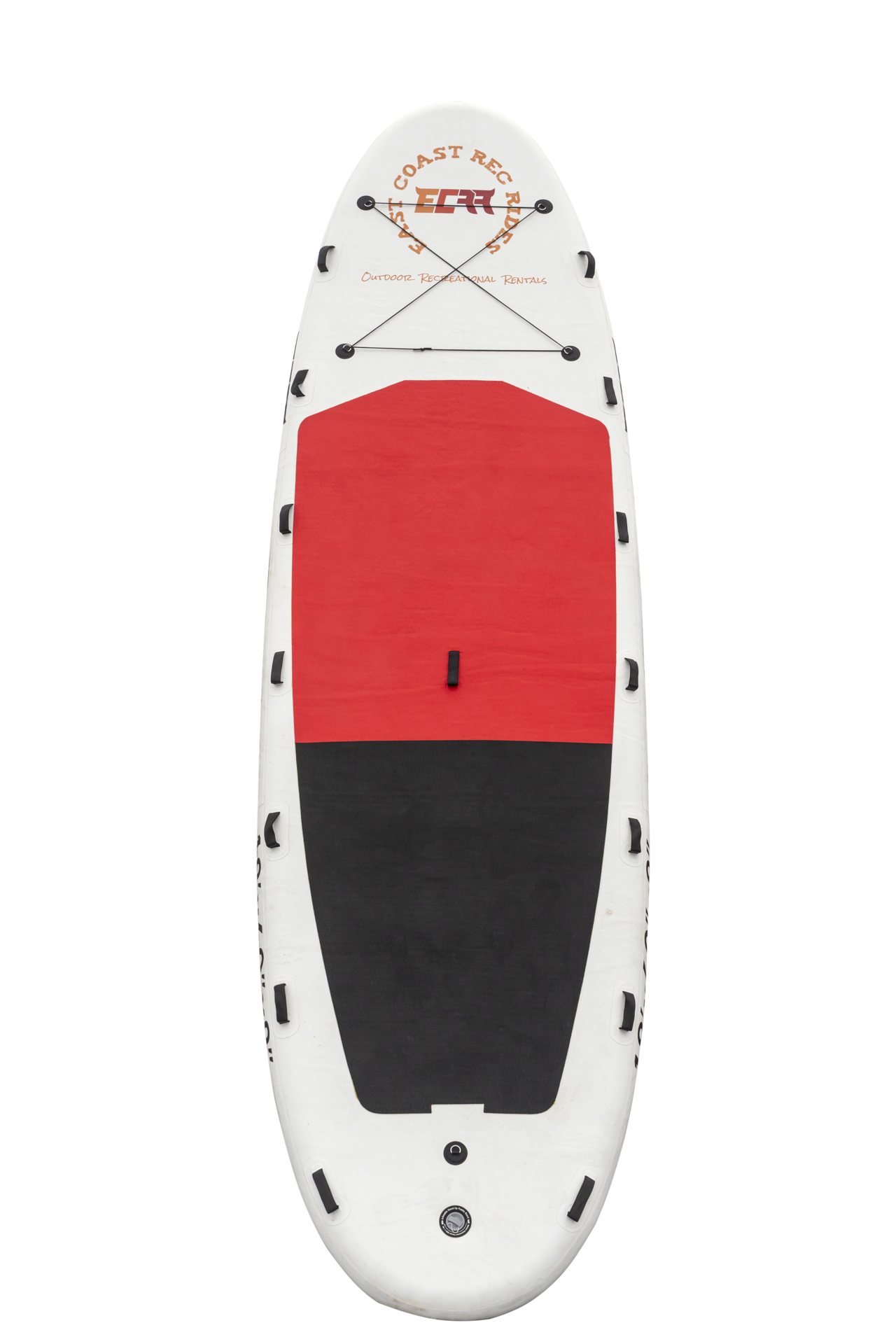 A family having fun and balancing on a large stand-up paddleboard in coastal waters